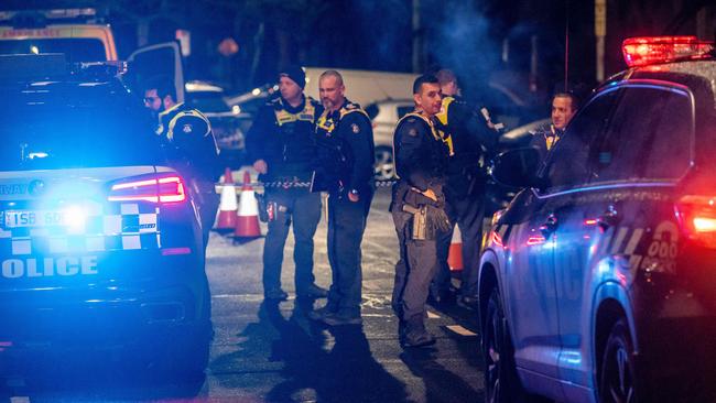 Police at the scene of a fatal shooting in Fitzroy. Picture: Jake Nowakowski