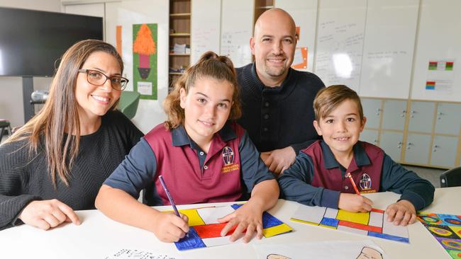 Lori and Vinny Maresca with their children, Matilda and Leo, at Tenison Woods Catholic School. Picture: Brenton Edwards