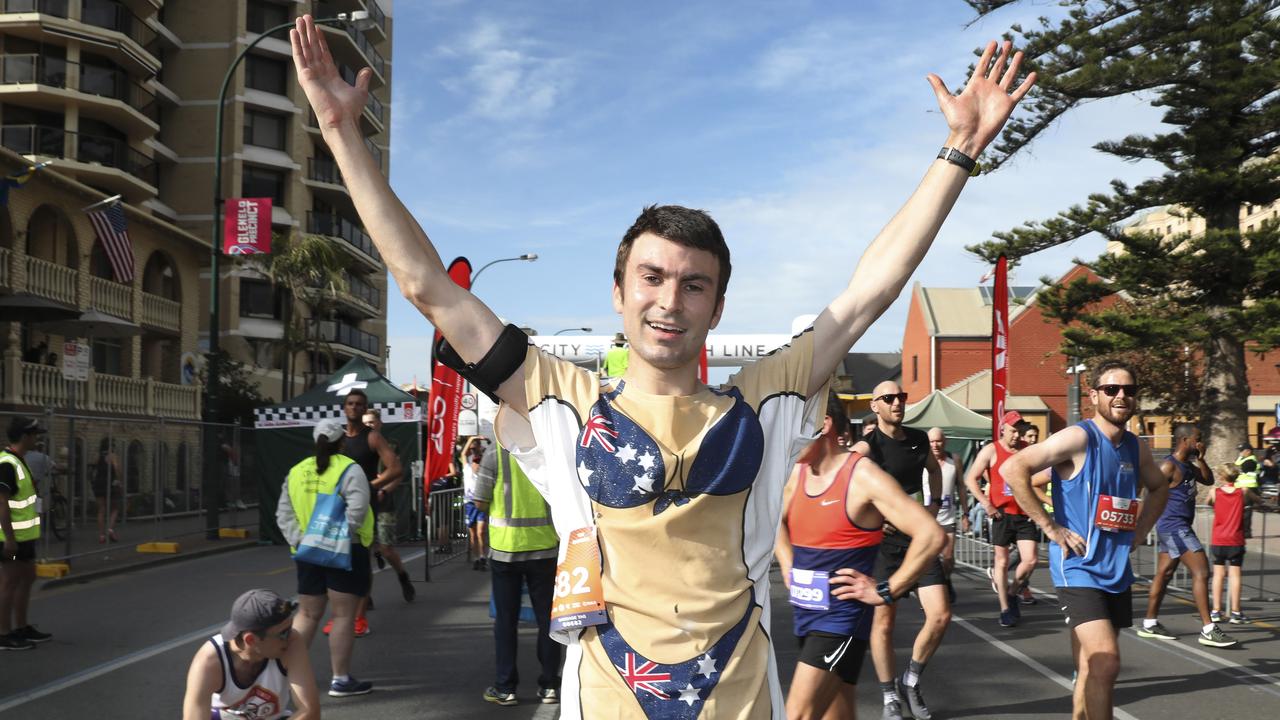 Frenchman Julien Veyrunes working in Adelaide for 12 months, in some rather fetching patriotic attire. Picture: Dean Martin/AAP