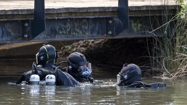 Poice police divers search for missing man Geoffrey McLean at Stebonheath Park in Andrews Farm. Picture: Naomi Jellicoe