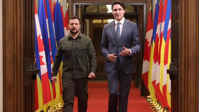 Ukrainian President Volodymyr Zelensky (L) and Canadian Prime Minister Justin Trudeau arrive at a signing ceremony on Parliament Hill in Ottawa on September 22, 2023. Picture: Patrick Doyle / POOL / AFP