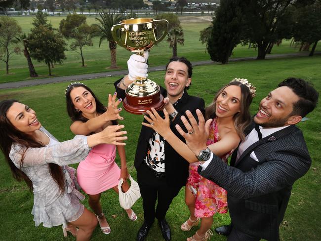 PeopleÃs Cup. The Melbourne Cup is still the Holy Grail to young people. Spring carnival fans Marina Elias, Annabelle Riesz, Fabio Guergues, Bianca Markovic and Gareth Folkard with the Melbourne Cup.                        Picture: David Caird