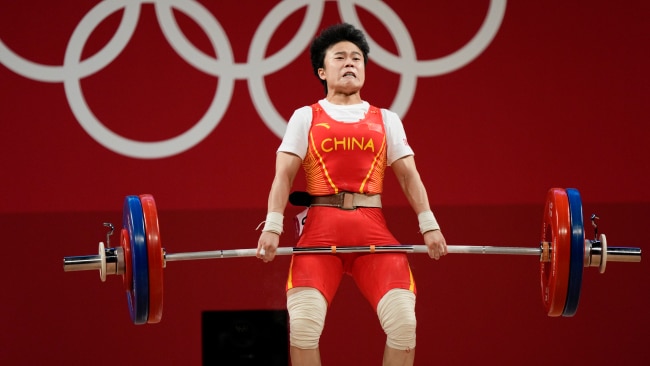 The photo published by Reuters. China's Hou Zhihui won the gold medal in the women's 49kg weightlifting at the Tokyo Olympics. Picture: Getty Images