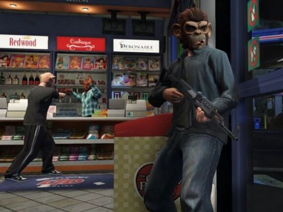 A frame grab of players robbing a service station in GTA Online.