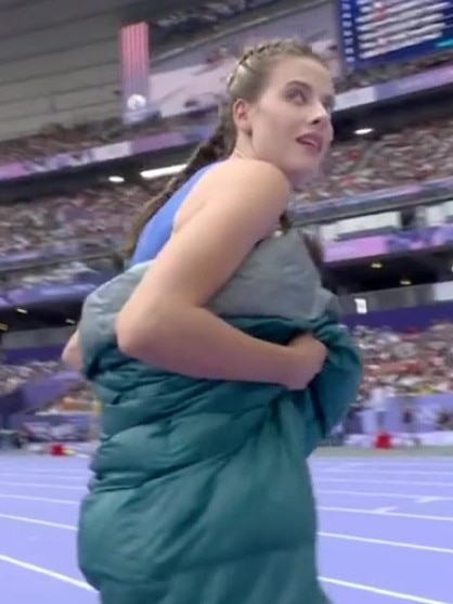 Ukraine's champ hopped in a sleeping bag to stay warm.