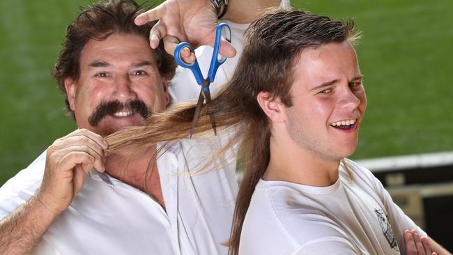 Matty Mayne, 17, is raising funds for the EJ Whitten Foundation by cutting off his big mullet and will coach alongside Dipper in the EJ Whitten Legends Game. Picture: David Crosling.