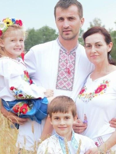 Andrew and Michelle Renkas with their children Nadia and David in traditional Ukrainian clothes and colours.