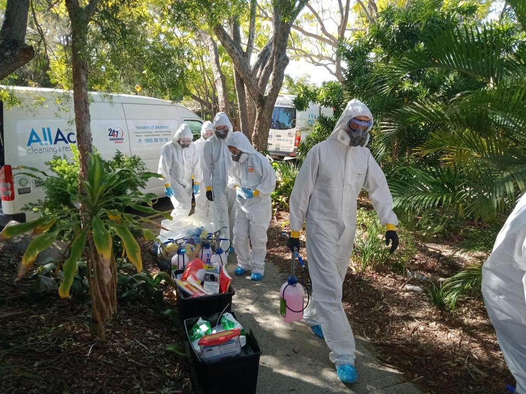 A Covid-19 cleaning crew descends on Indooroopilly State High School after a student tested positive. Picture: Grace Grace Facebook