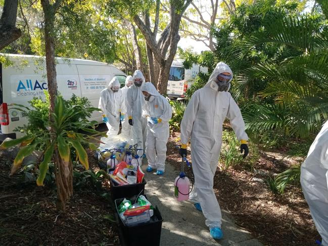 A Covid-19 cleaning crew descends on Indooroopilly State High School after a student tested positive. Picture: Grace Grace Facebook