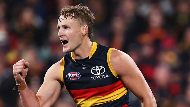 ADELAIDE, AUSTRALIA – APRIL 19: Jordan Dawson of the Crows celebrates a goal during the 2024 AFL Round 06 match between the Adelaide Crows and the Essendon Bombers at Adelaide Oval on April 19, 2024 in Adelaide, Australia. (Photo by James Elsby/AFL Photos via Getty Images)