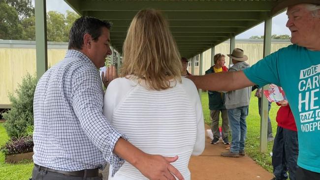 Nationals MP Pat Conaghan and his wife Ilana are harassed by a teal independent candidate’s volunteer on the way to voting.