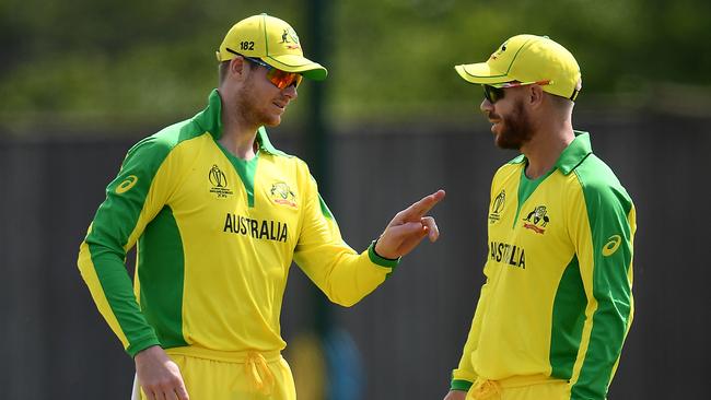 SOUTHAMPTON, ENGLAND - MAY 22: Steve Smith and David Warner of Australia chat during the One Day International match between Australia and West Indies at the Ageas Bowl on May 22, 2019 in Southampton, England. (Photo by Harry Trump/Getty Images)