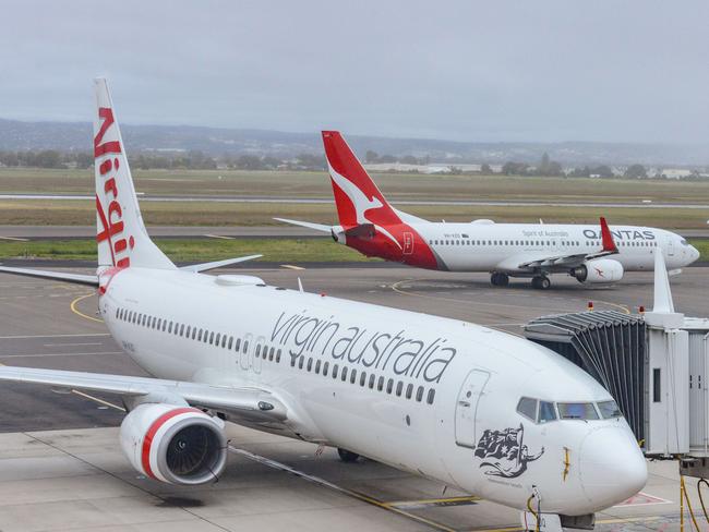 ADELAIDE, AUSTRALIA - NewsWire Photos SEPTEMBER 22, 2021: Virgin, Qantas and Cobham aircraft at Adelaide Airport. Picture: NCA NewsWire /Brenton Edwards