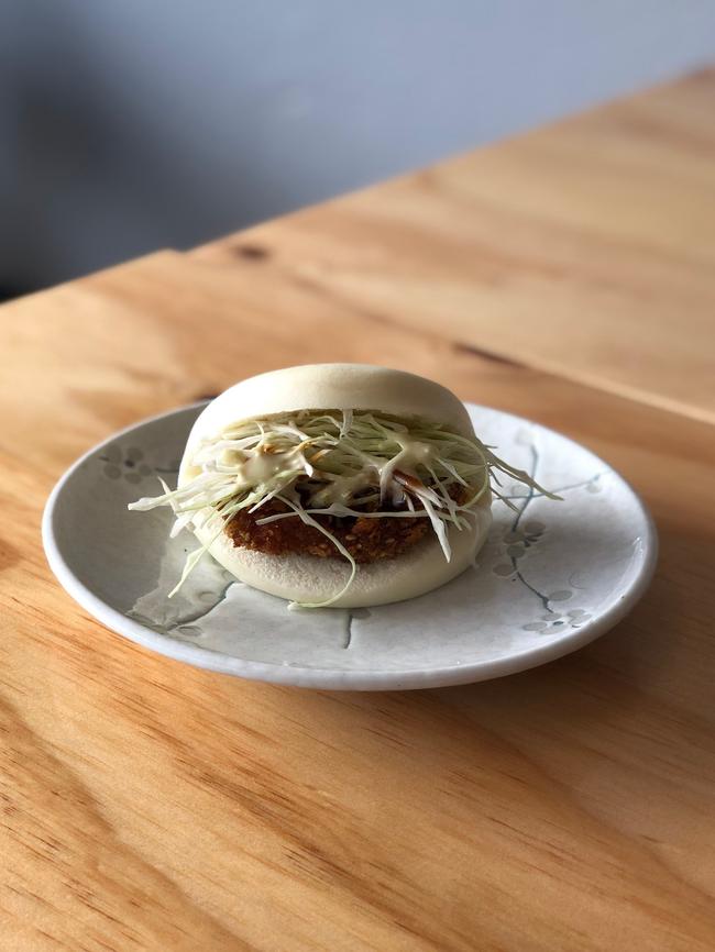 Pork katsu bun with wasabi jerk mayo.