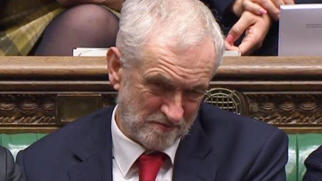 Jeremy Corbyn was caught on camera muttering “stupid woman” at Theresa May in the House of Commons. Picture; AFP. 