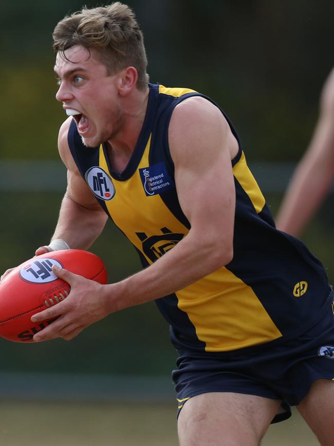 Tom Simpson in action for Hurstbridge. Picture: Stuart Milligan