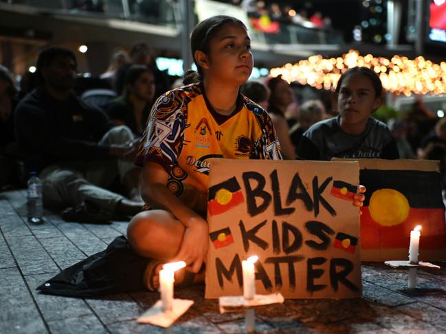 BRISBANE, AUSTRALIA - NOVEMBER 02: Mourners hold a candlelight vigil for murdered teenager Cassius Turvey on November 02, 2022 in Brisbane, Australia. Cassius Turvey, 15, died in a Perth hospital last Sunday after he was violently assaulted in the suburb of Middle Swan. Turvey was walking in the area with friends when he was assaulted. His death has triggered a wave of outrage across Australia, with many vigils and memorials taking place in all capital cities and towns demanding justice. (Photo by Dan Peled/Getty Images)