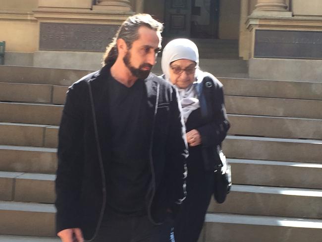 Johayna Merhi’s mother-in-law and husband outside Sydney Central court.