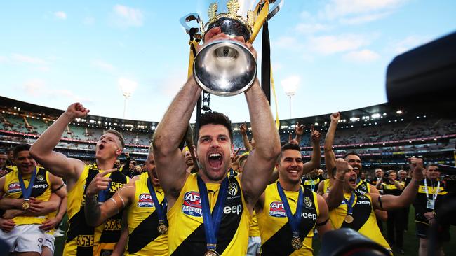 Trent Cotchin celebrates with the premiership cup. Picture: Phil Hillyard