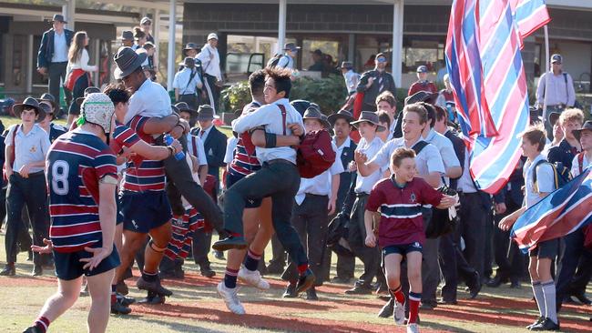 The Southport School celebrate after beating Gregory Terrace at St Joseph's College Playing Field, Tennyson, Saturday August 31, 2019. (AAP/Image Sarah Marshall)