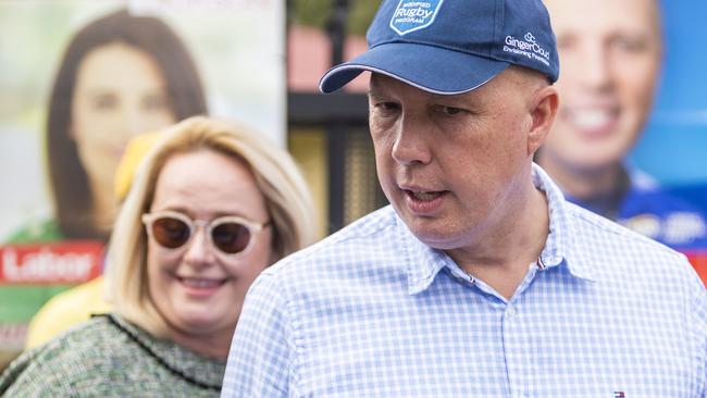 Federal Member for Dickson Peter Dutton and his wife Kirilly are seen at Pine Rivers State High School on Election Day in Brisbane, Saturday, 18 May, 2019. Approximately 16.5 million Australians will vote in what is tipped to be a tight election contest between Australian Prime Minister Scott Morrison and Australian Opposition leader Bill Shorten. (AAP Image/Glenn Hunt) NO ARCHIVING