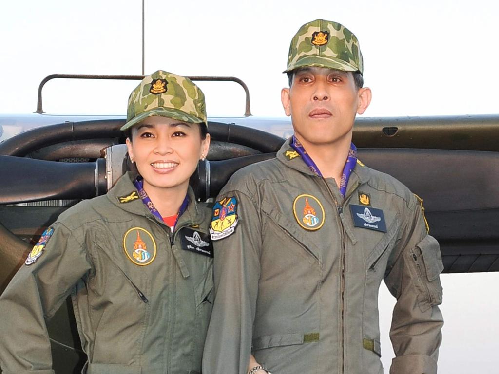 King Maha Vajiralongkorn and Queen Suthida, who also enjoyed a military ranking. Picture: Thai Royal Household Bureau / AFP