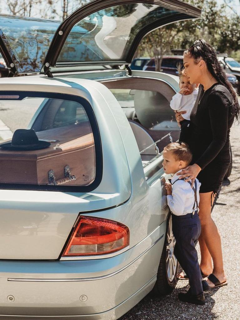 Keda and her boys at their father's funeral service. Picture: Madi Lee Photography