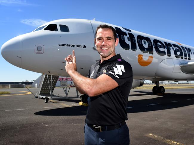 Melbourne Storm captain Cameron Smith with a new Tigerair plane that has been named after him. Picture: Kylie Else