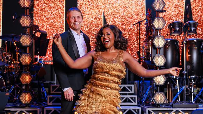 Star of Tina – The Tina Turner Musical, Ruva Ngwenya, with Wayne Pearce, who starred in the famous NRL campaign with Tina back in 1990, at The Theatre Royal, Sydney. Picture: Justin Lloyd/The Daily Telegraph.