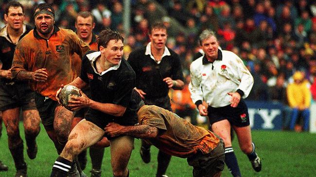 Andrew Mehrtens runs during the All Blacks’ biggest ever victory margin over the Wallabies in 1996.