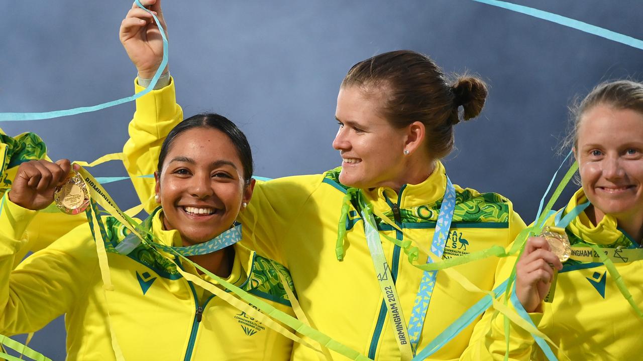 Tahlia McGrath, Alana King, Jess Jonassen and Alyssa Healy with their gold medal at the Birmingham 2022 Commonwealth Games.