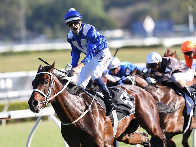 Jockey Hugh Bowman riding Winx, reacts as they win The Star 150th Epsom at Randwick racecourse in Sydney. Saturday, October 3, 2015. Picture: AAP Image/David Moir