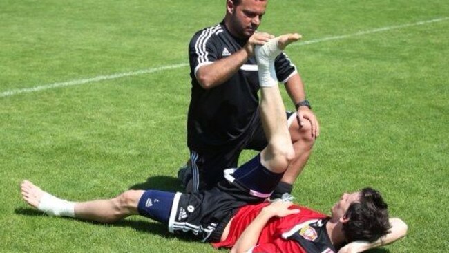 Robbie Kruse works with the club’s fitness manager Daniel Jouvin Abraham last year.