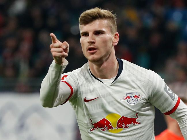 (FILES) In this file photo taken on November 23, 2019 Leipzig's German forward Timo Werner celebrates scoring the opening goal during the German first division Bundesliga football match RB Leipzig v FC Cologne in Leipzig, eastern Germany, on November 23, 2019. - Chelsea announced the signing of German international forward Timo Werner from RB Leipzig on June 18, 2020 in the first major move of the summer transfer market. (Photo by Odd ANDERSEN / AFP) / RESTRICTIONS: DFL REGULATIONS PROHIBIT ANY USE OF PHOTOGRAPHS AS IMAGE SEQUENCES AND/OR QUASI-VIDEO