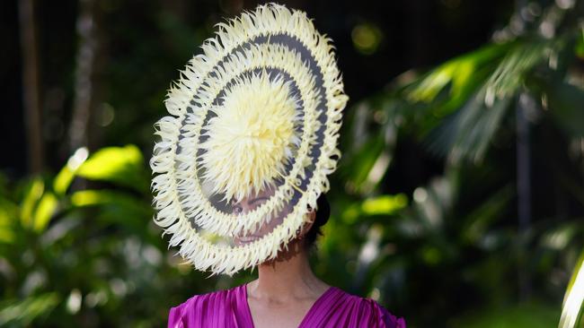 N.A.T. Millinery owner Natalie Taylor was selected to compete in this year's Melbourne Cup Carnival's Fashions on the Field competition at the Victoria Racing Club, Flemington. She was awarded first runner up for this bespoke headpiece, titled Leto, painstakingly created with 250 Nagori goose feathers, individually hand cut and stitched one by one into the framework. Picture: Brendan Radke