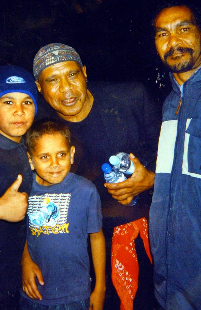 Norma’s late son Hayden (left), his cousin Reggie Fisher and singer Archie Roach with Hayden’s father, Joe Duncan (right).