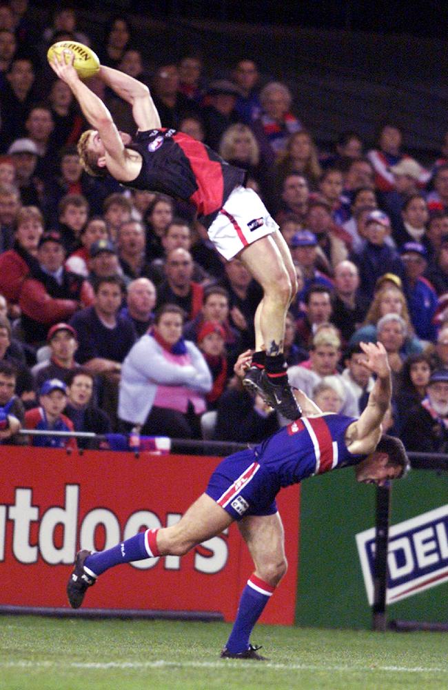 Gary Moorcroft takes his mark of the year in 2001 over Brad Johnston.