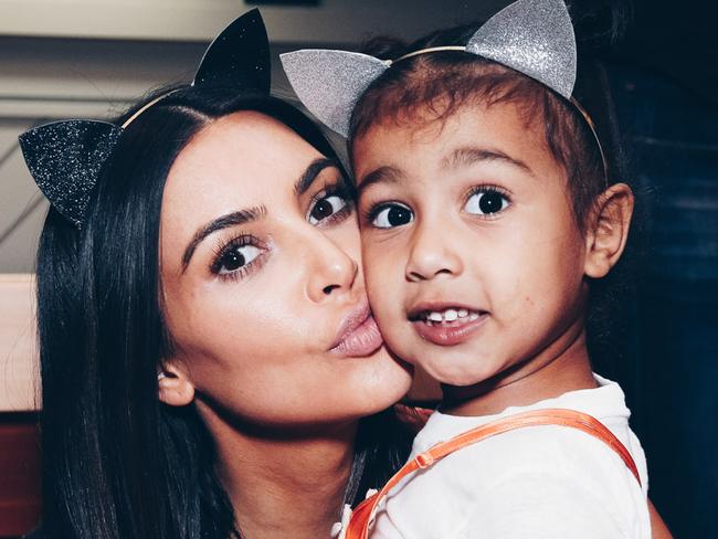 INGLEWOOD, CA - MARCH 31:  In this handout photo provided by Forum Photos,  Among the VIP guests of Managing Partner, Shelli Azoff, and Ariana Grande's manager, Scooter Braun, in the exclusive Forum Club enjoying the Ariana Grande Dangerous Woman show at the Forum were Kim Kardashian and daughter, North West on March 31, 2017 in Inglewood, California.  (Photo by Rich Fury/Forum Photos via Getty Images)