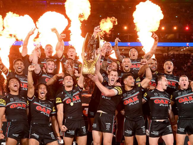 SYDNEY, AUSTRALIA - OCTOBER 01: The Panthers players celebrate victory as the hold up the premiership trophy after the 2023 NRL Grand Final match between Penrith Panthers and Brisbane Broncos at Accor Stadium on October 01, 2023 in Sydney, Australia. (Photo by Bradley Kanaris/Getty Images)