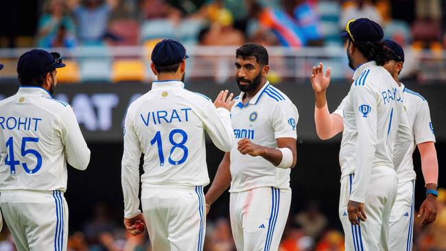 India's Jasprit Bumrah celebrates yet another wicket. Photo by Patrick HAMILTON / AFP.