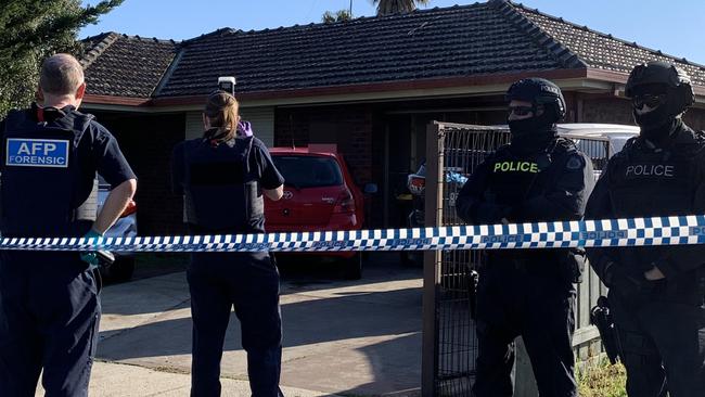 Specialist police have swarmed on a house linked to the man behind yesterday's horror Bourke St attack. Picture: Brianna Travers