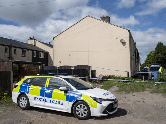 ROCHDALE, ENGLAND - MAY 04: Police forensic officers search a house on May 04, 2025 in Rochdale, England. According to Metropolitan Police, five men were arrested overnight during pre-planned counter terrorism raids in Greater Manchester, Swindon, and London, as part of an investigation into 
