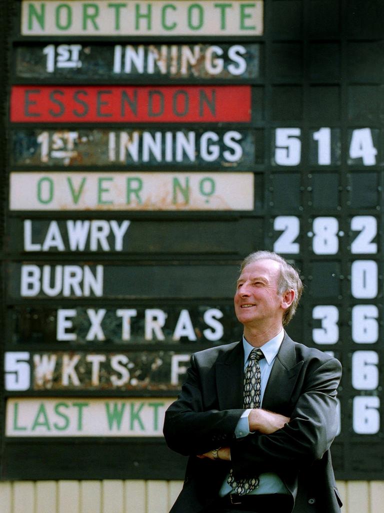 Lawry in front of the scoreboard at the Northcote Cricket Oval that now bears his name.