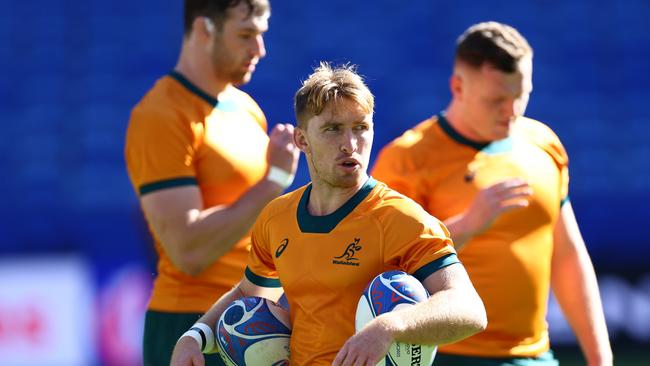 LYON, FRANCE - SEPTEMBER 23: Tate McDermott of the Wallabies runs through drills during the Australia captain's run ahead of their Rugby World Cup France 2023 match against Wales at Parc Olympique on September 23, 2023 in Lyon, France. (Photo by Chris Hyde/Getty Images)