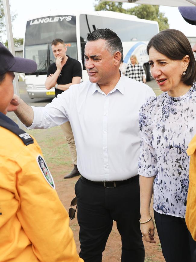 NSW Premier Gladys Berejiklian and Deputy Premier John Barilaro greet emergency services volunteers. Picture: Dylan Robinson