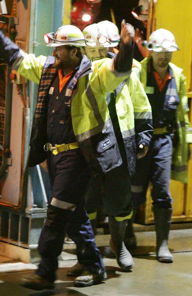 Miners Todd Russell and Brant Webb emerge from Beaconsfield Gold Mine on Tuesday, May 9, 2006. They survived for two weeks in a kennel-size cage trapped nearly a kilometre (3,000 feet) underground. Picture: Ian Waldie