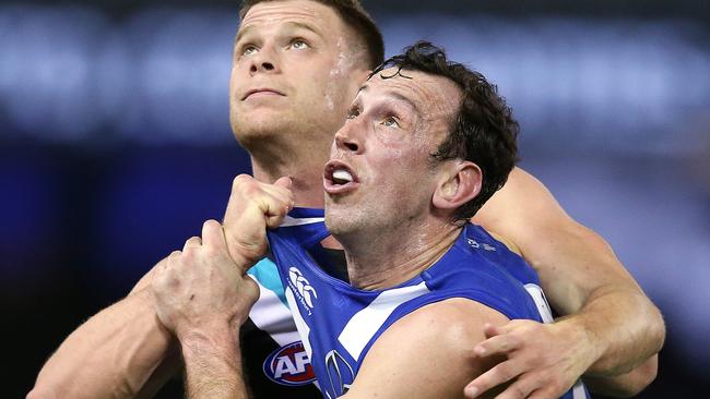 Todd Goldstein goes up against Peter Ladhams in the ruck. Picture: Michael Klein