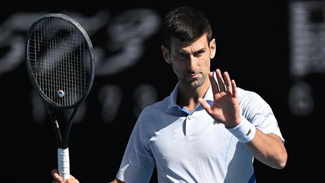 Djokovic refuses to lay down. (Photo by Lillian SUWANRUMPHA / AFP)