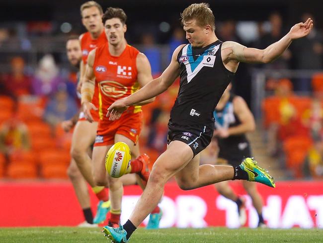 Wines pushes the Power forward. (Photo by Chris Hyde/Getty Images)