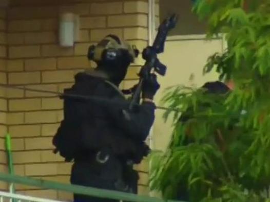 Man in custody after overnight siege